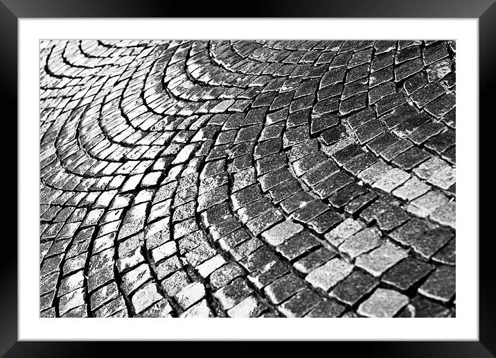 Cobblestone pavement after rain Framed Mounted Print by Gabor Pozsgai