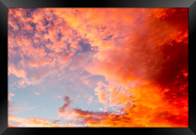 red cloudscape at sunset. Framed Print by PhotoStock Israel