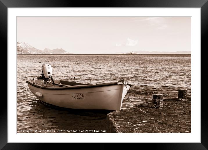 Split toned image of a boat moored at Orebic Framed Mounted Print by Jason Wells