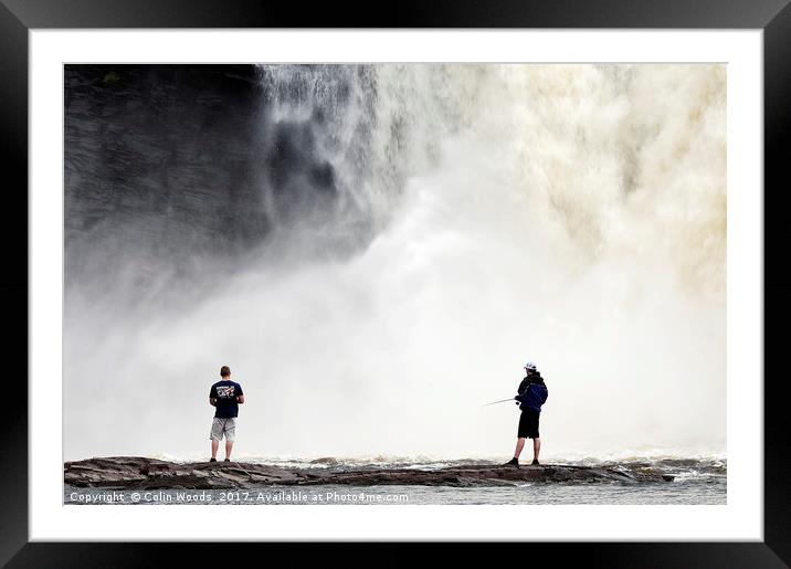 River fishing by a big waterfall in Quebec Framed Mounted Print by Colin Woods