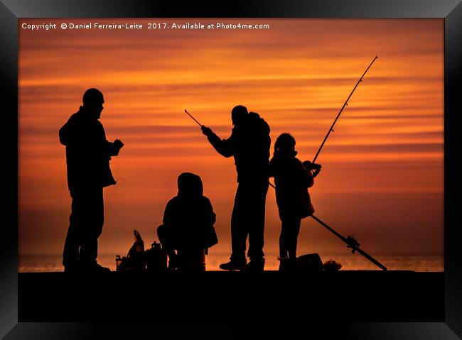 People Fishing at Breakwater Framed Print by Daniel Ferreira-Leite