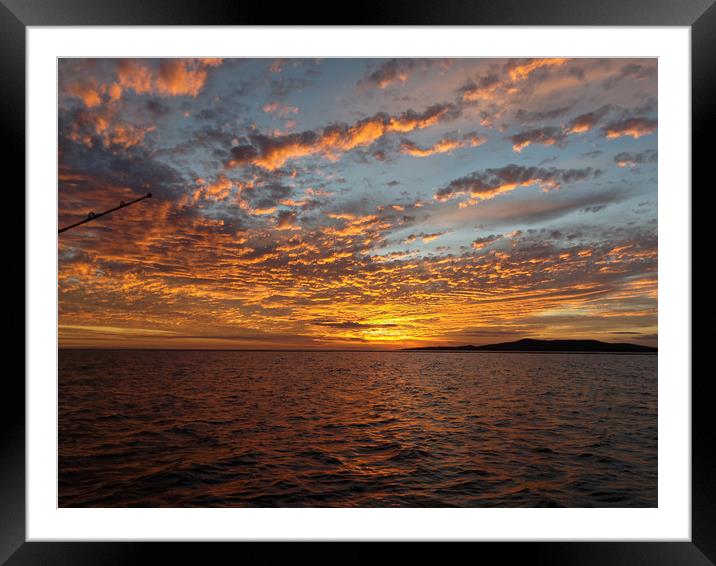 Vibrant Orange colored cloudy sunset seascape. Coa Framed Mounted Print by Geoff Childs