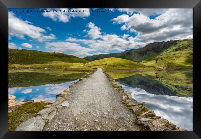 Llyn Llydaw Causeway Wales Framed Print by Adrian Evans