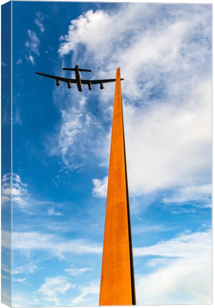 Lancaster over the IBCC spire Canvas Print by Gary Eason