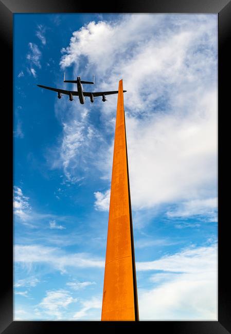 Lancaster over the IBCC spire Framed Print by Gary Eason