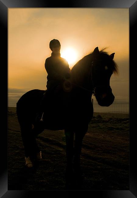 Horse Rider and Morning Light Framed Print by Eddie Howland
