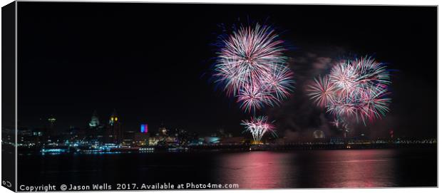 Colourful fireworks above the Liverpool skyline Canvas Print by Jason Wells
