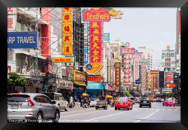 Traffic and chinese signs Framed Print by Kevin Hellon