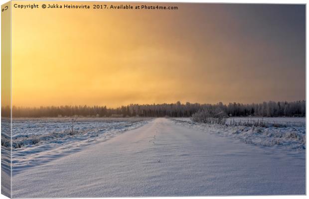 Snowy Road In The Winter Sunrise Canvas Print by Jukka Heinovirta