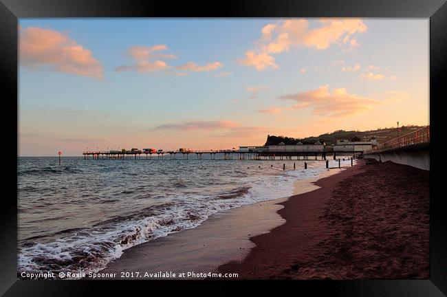 The sun sets over Teignmouth Pier in South Devon Framed Print by Rosie Spooner