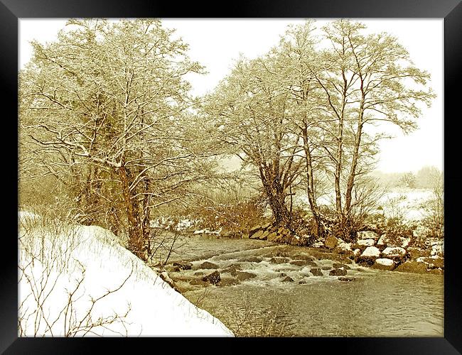 Snow Stream Falls.Rhymney River. Framed Print by paulette hurley