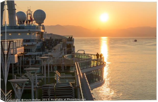 Sunrise over cruise ship Canvas Print by Kevin Hellon