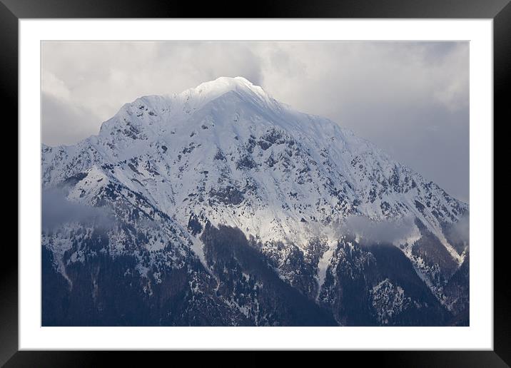 Snowy Alpine peak Framed Mounted Print by Ian Middleton