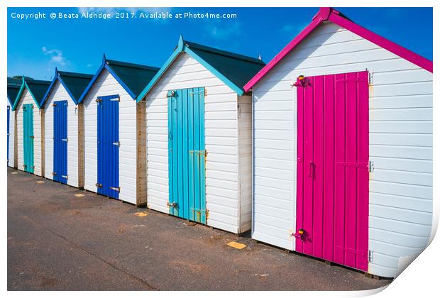 Colorful wooden beach huts Print by Beata Aldridge