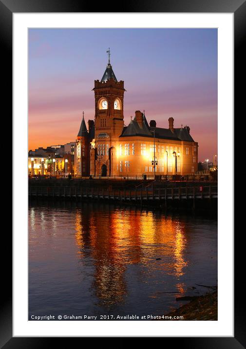 Cardiff Bay's Pierhead: A Dusk Enchantment Framed Mounted Print by Graham Parry