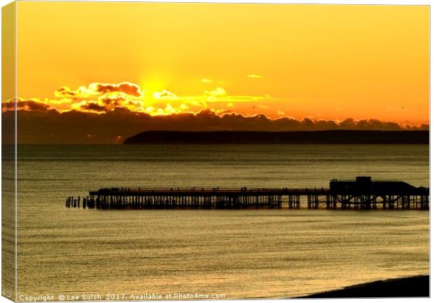 Hastings Pier at sunset Canvas Print by Lee Sulsh