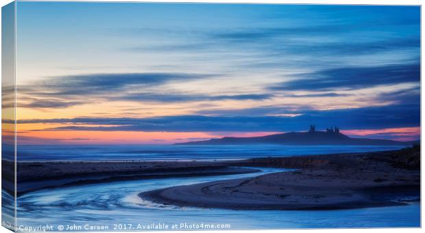Embrace the Serenity of Northumberlands Coastal Su Canvas Print by John Carson
