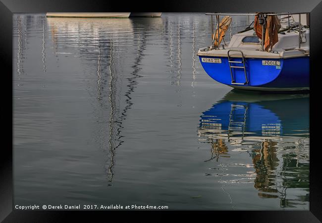 Boat & Reflections Framed Print by Derek Daniel
