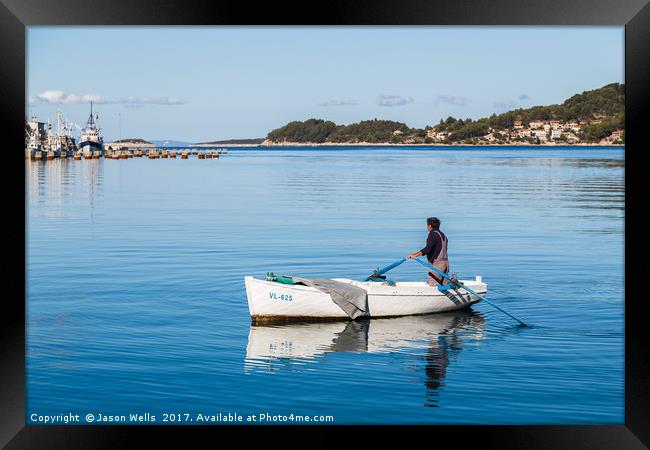Reflections of a fishing boat at Vela Luka Framed Print by Jason Wells