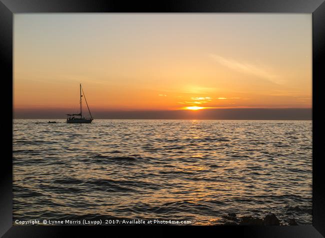 Boat at Sunset Framed Print by Lynne Morris (Lswpp)