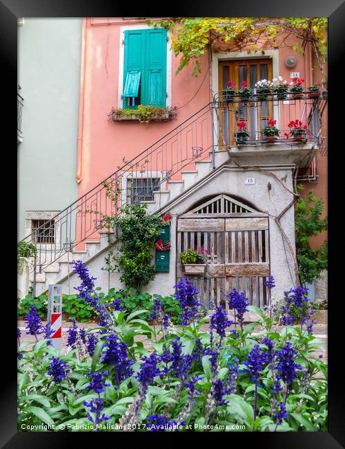 A pretty corner in a countryside village of Italy Framed Print by Fabrizio Malisan