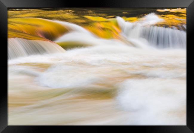 Abstract rendition of heavily flooded waterfall Framed Print by Steve Heap
