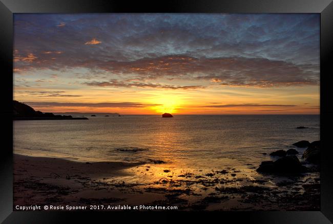 Sunrise over Black Rock at Millendreath Beach Looe Framed Print by Rosie Spooner