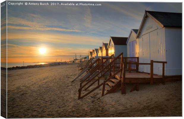 Old Felixtowe beach hut Sunset Canvas Print by Antony Burch