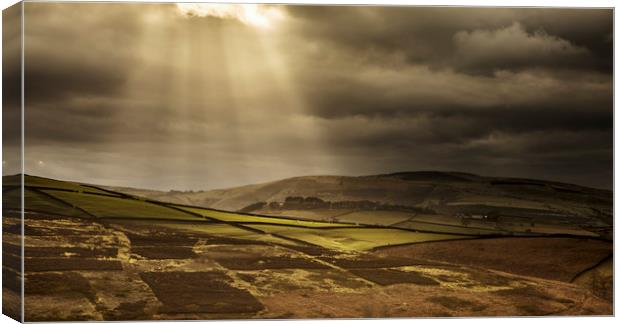 Crepuscular rays over the Yorkshire Dales Canvas Print by Peter Scott