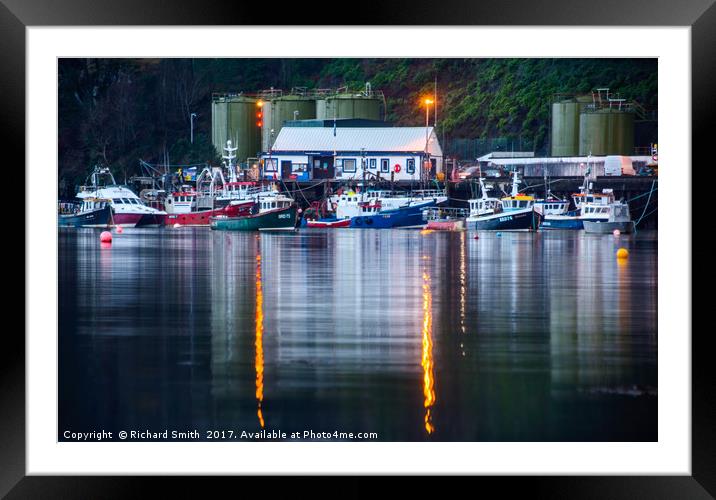 The business end of Portree pier. Framed Mounted Print by Richard Smith
