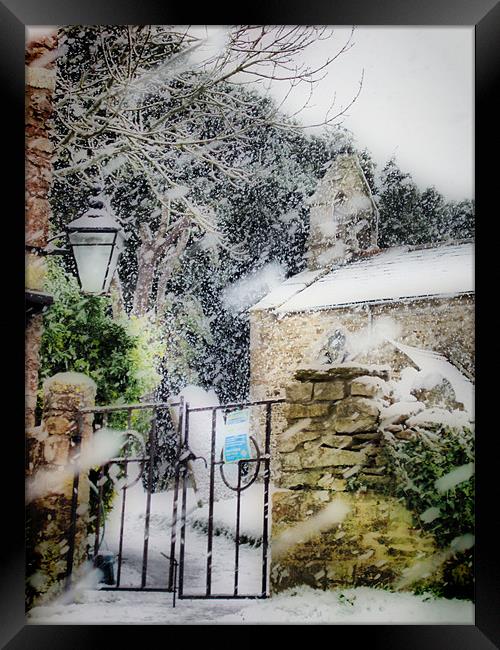 Village Church in Snowstorm Framed Print by Nicola Clark