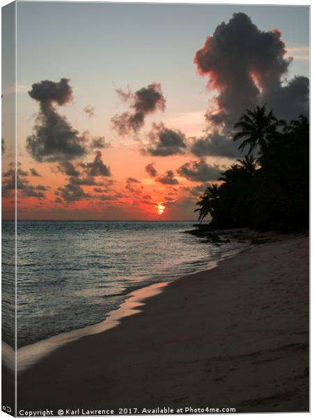 Sunset Over The Maldives Canvas Print by Karl Lawrence