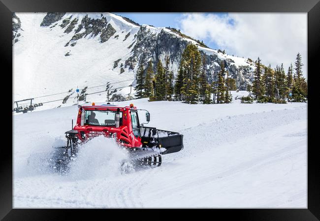 Snow plough clearing snow Framed Print by David Belcher