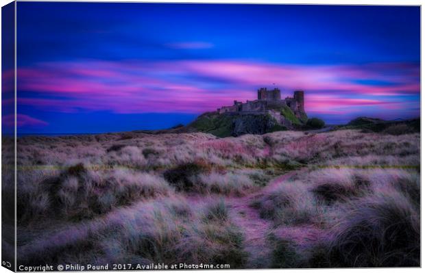 Dreamy Bamburgh Castle at Sunset Canvas Print by Philip Pound