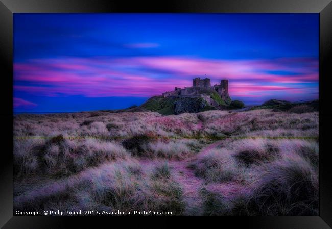 Dreamy Bamburgh Castle at Sunset Framed Print by Philip Pound