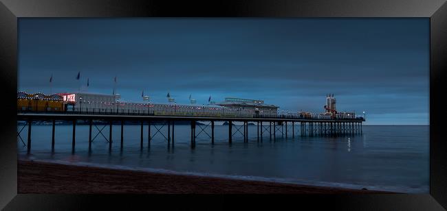 Paignton Pier at Night Framed Print by Dave Rowlatt