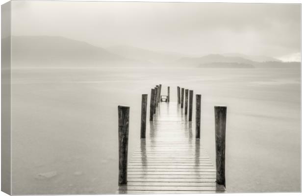 Ashness jetty in the pouring rain Canvas Print by Peter Scott