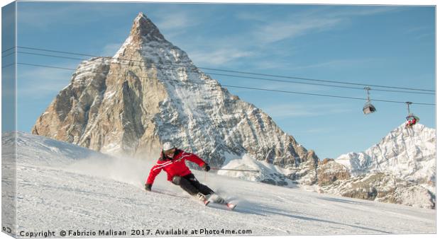 Skiing by the Matterhorn Mountain in Zermatt Canvas Print by Fabrizio Malisan