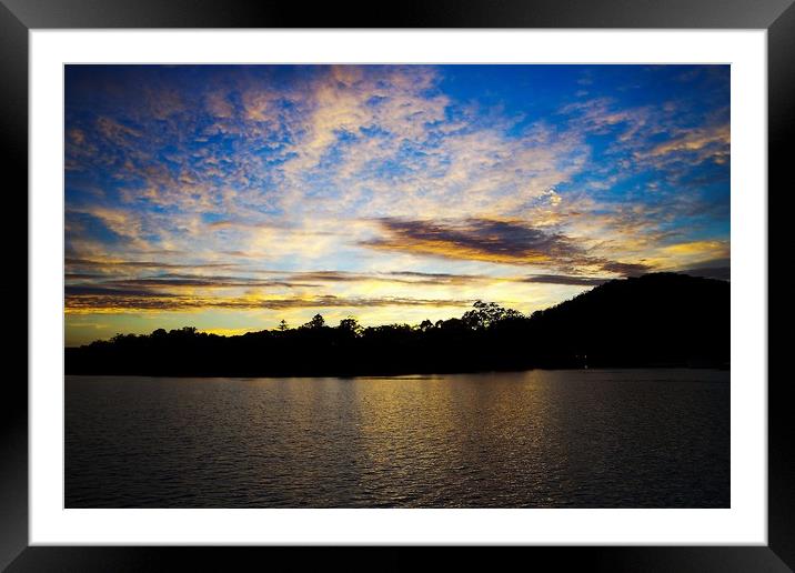 Dramatic gold blue sunrise seascape. Framed Mounted Print by Geoff Childs