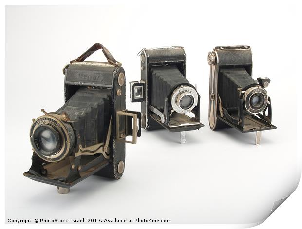 old film cameras Print by PhotoStock Israel