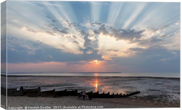 Crepuscular Rays over Whitstable Beach Canvas Print by Kentish Dweller