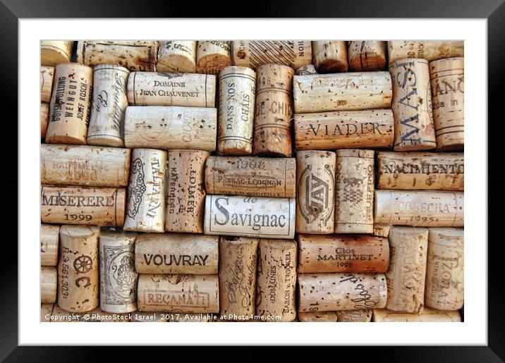 an assortment of wine bottle corks Framed Mounted Print by PhotoStock Israel