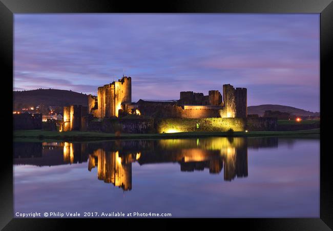 Caerphilly Castle Floodlit Reflection. Framed Print by Philip Veale