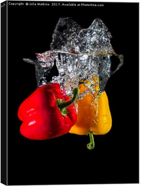Red and Yellow pepper dropped in Water  Canvas Print by Julia Watkins
