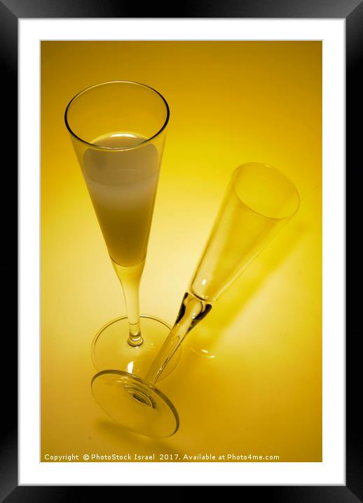 An elegant glass of grapefruit juice Framed Mounted Print by PhotoStock Israel