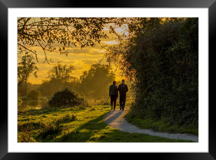 Walking in the Golden Light Framed Mounted Print by Kelly Bailey