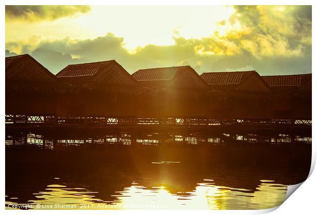 Beautiful sunrise over wooden lake huts Print by  