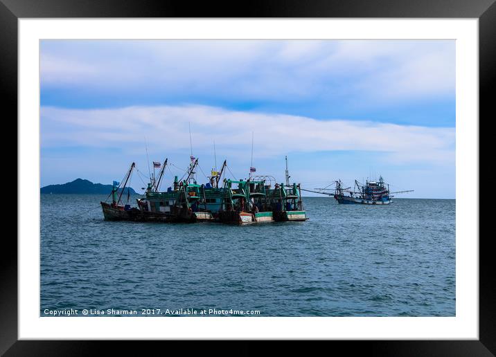 Fishing boats at sea in Thailand Framed Mounted Print by  
