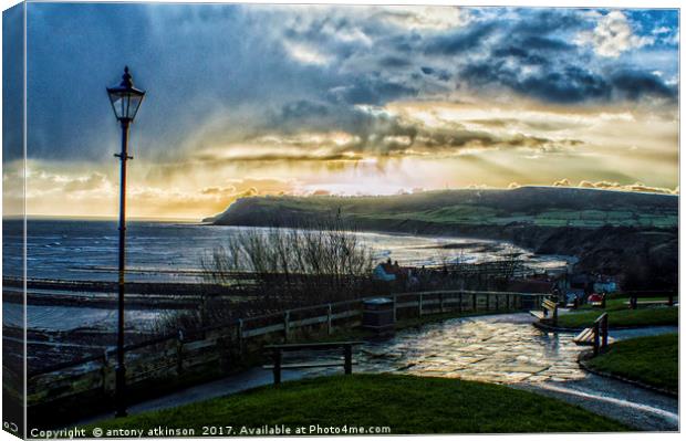 Looking Across Robin Hood's Bay Canvas Print by Antony Atkinson