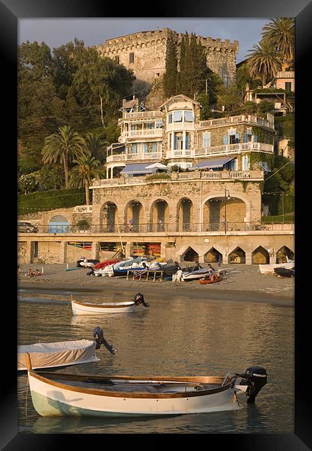 Boats moored at Levanto Beach. Framed Print by Ian Middleton